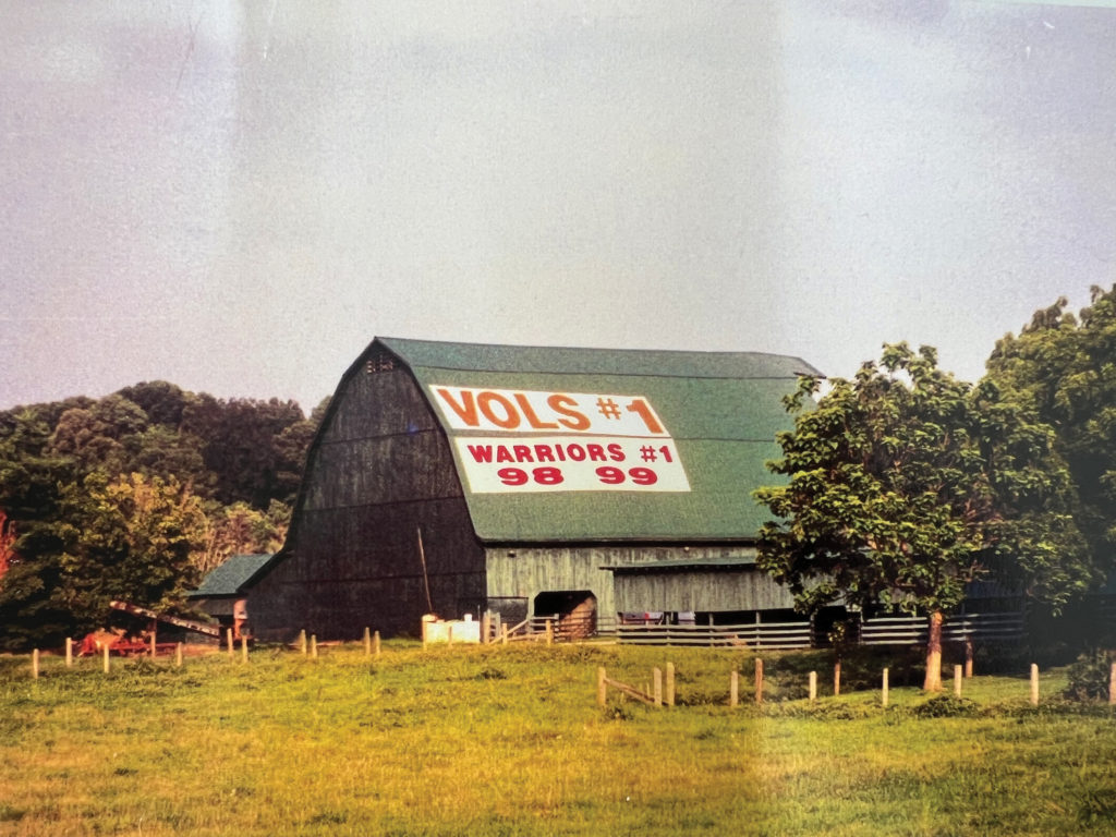 The cattle shed at Johnson Farm that says VOLS #1