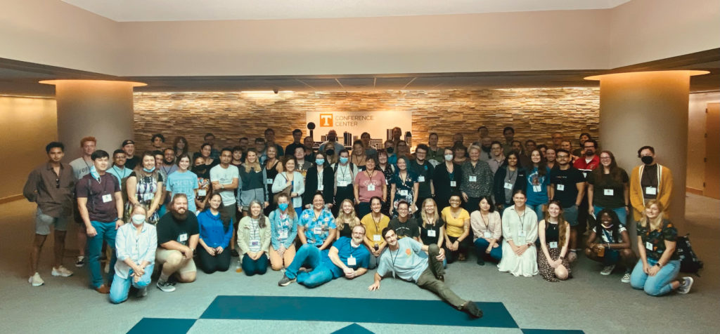 Indoor group photo of participants in the inaugural Global Amphibian and Reptile Disease Conference