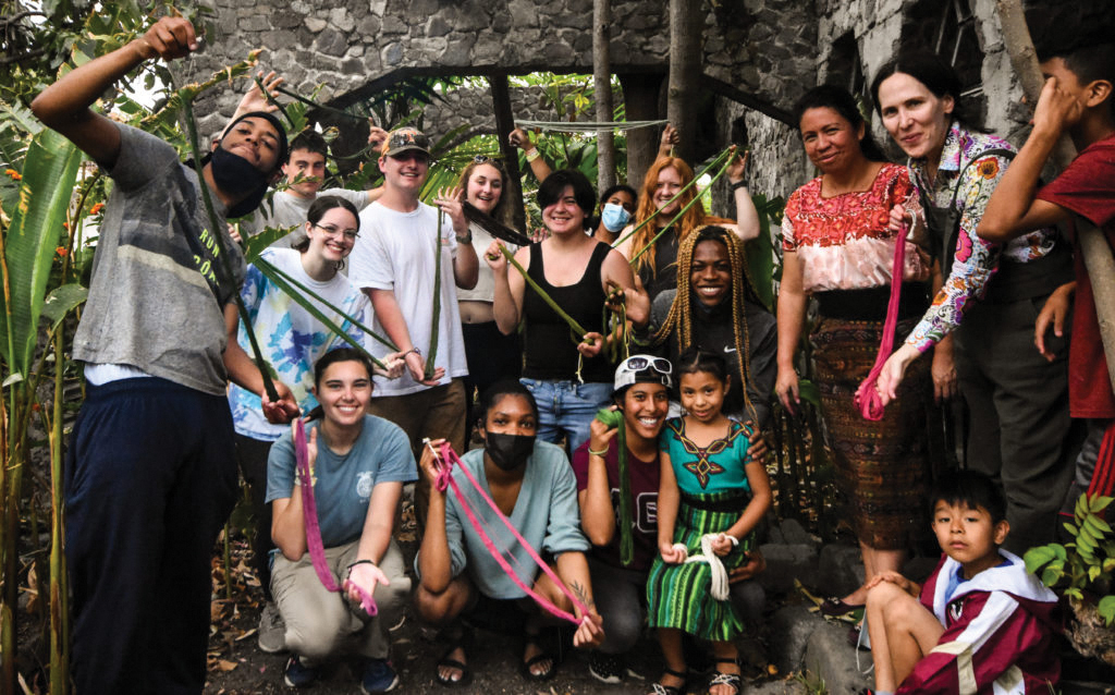 Students from the 2022 trip pictured with the Mayan women’s group Kemajachel