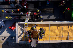 First responders doing a safety demonstration in a grain bin