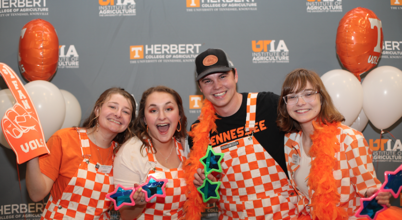 Herbert students dressed in UT Orange and white checkerboard