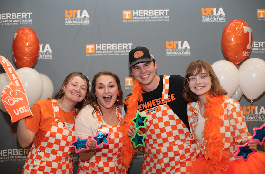 Herbert students dressed in UT Orange and white checkerboard