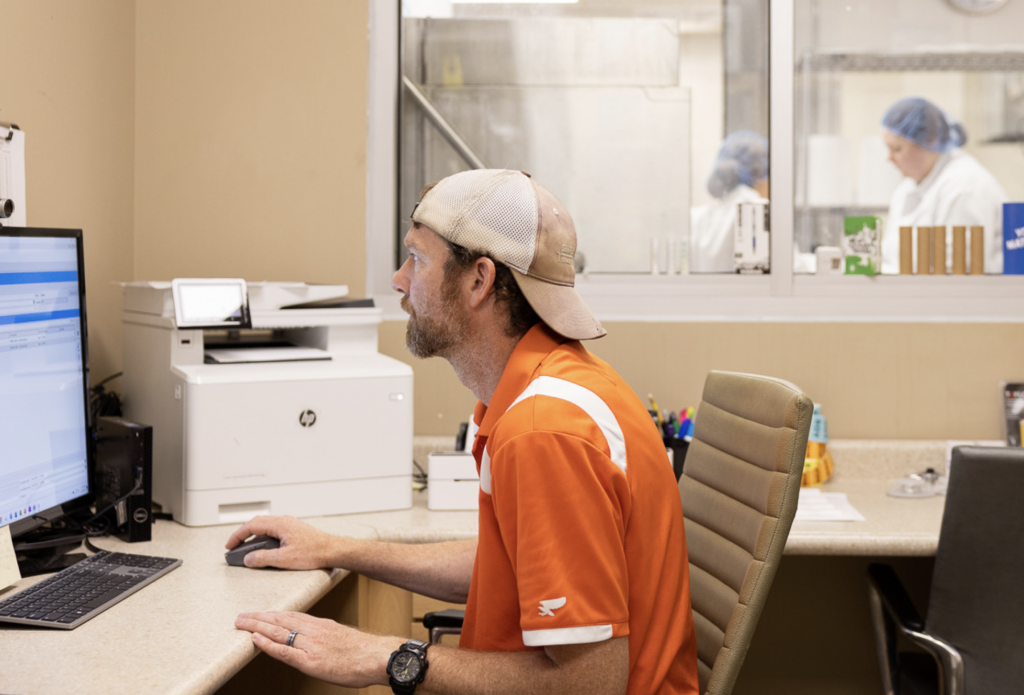 Nathan Miller working on his computer