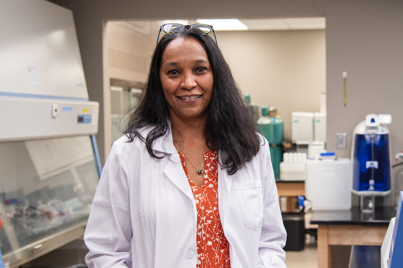 Niki Labbé wearing a lab coat