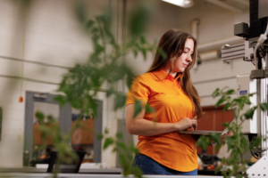 Student working with a farm bot