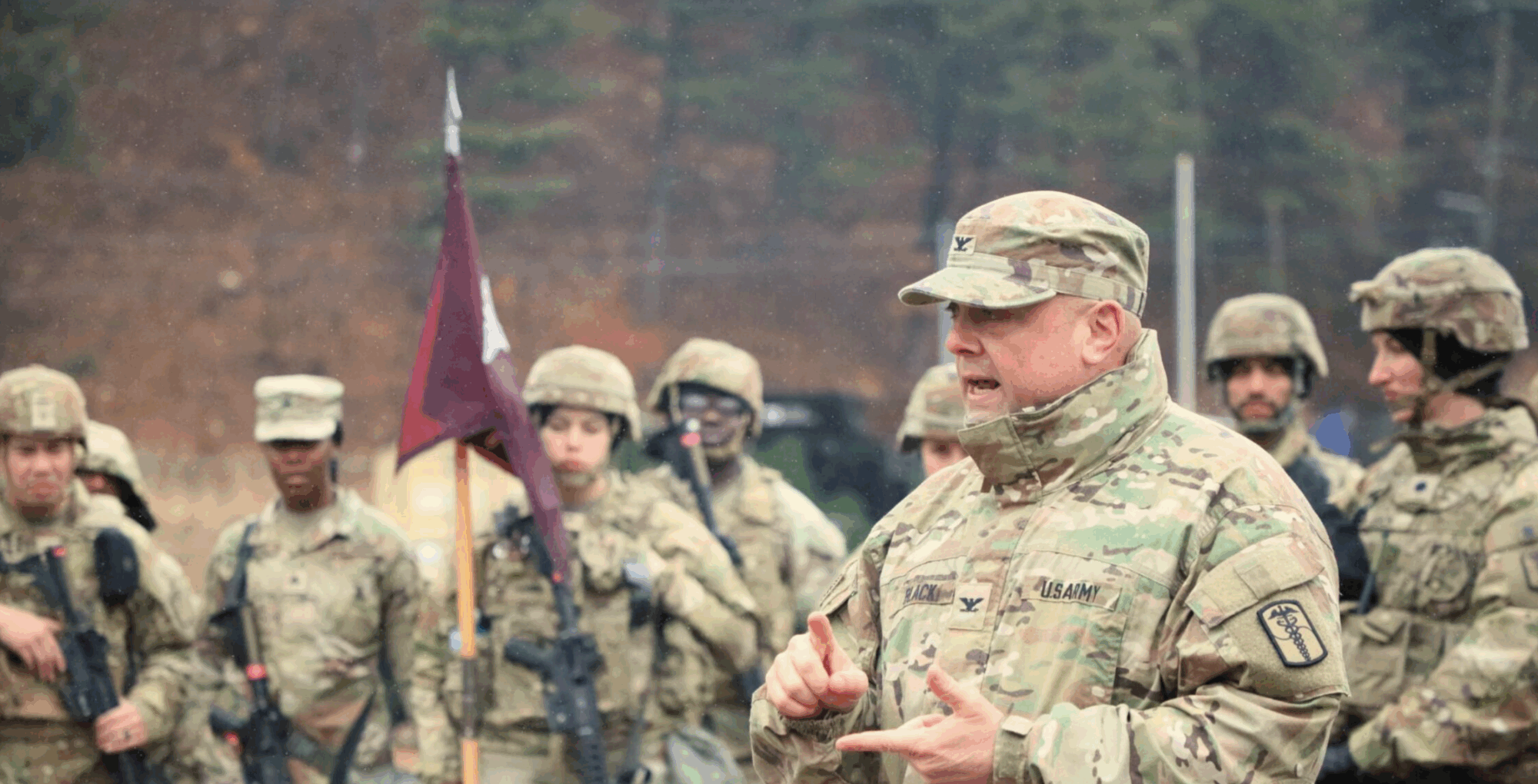 Army colonel addressing soldiers