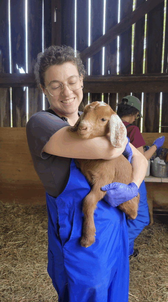 UTCVM student holding a meat goat