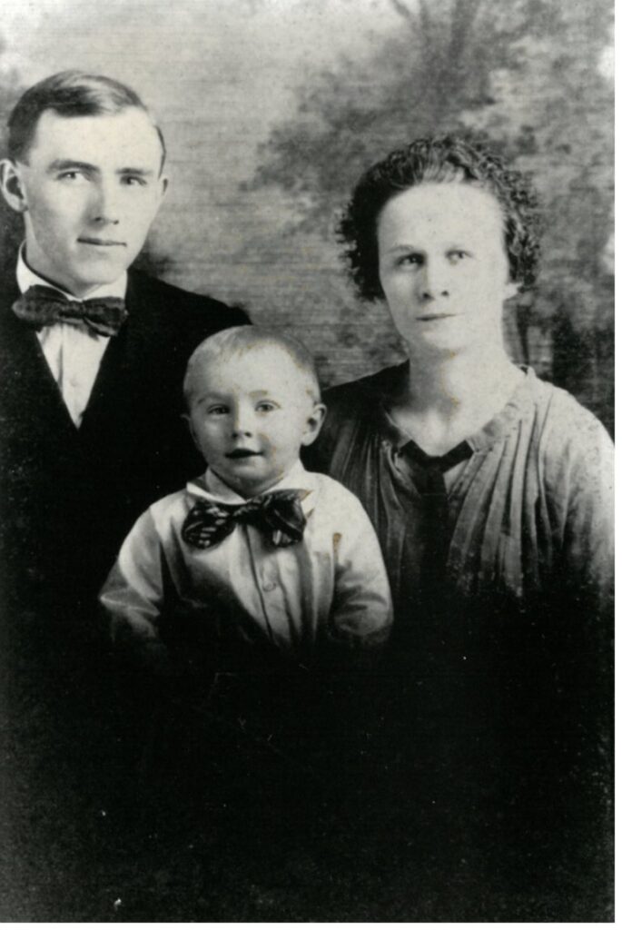 Black and white portrait of Charlie and Mattie Elrod with their child