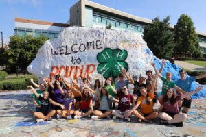Tennessee 4-H'ers at the UT Knoxville Rock where they have painted the 4-H clover and "Welcome to Roundup"