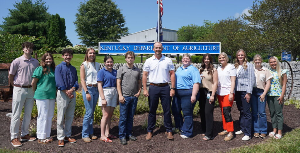 Interns pose at the entrance to the Kentucky Department of Agriculture with Commissioner Jonathan Shell. Herbert College of Agriculture junior Callie Hudson is the third from the right.