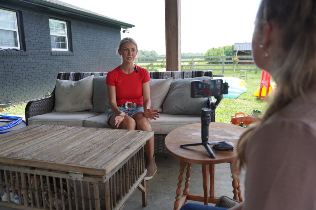Herbert College of Agriculture junior Callie Hudson interviews Emily Rock, who raises many kinds of animals on a small family farm and runs a farm school on her property to educate families in the community about agriculture.