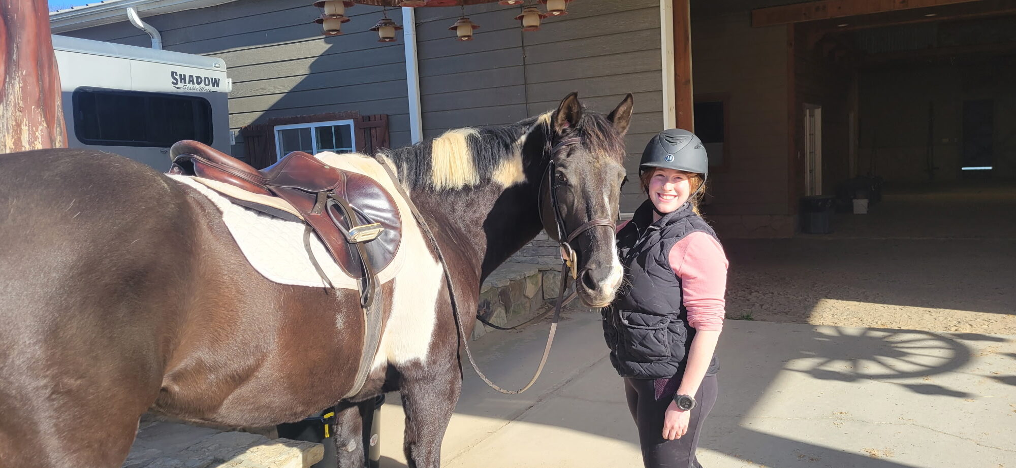 Caroline Griffin next to a horse